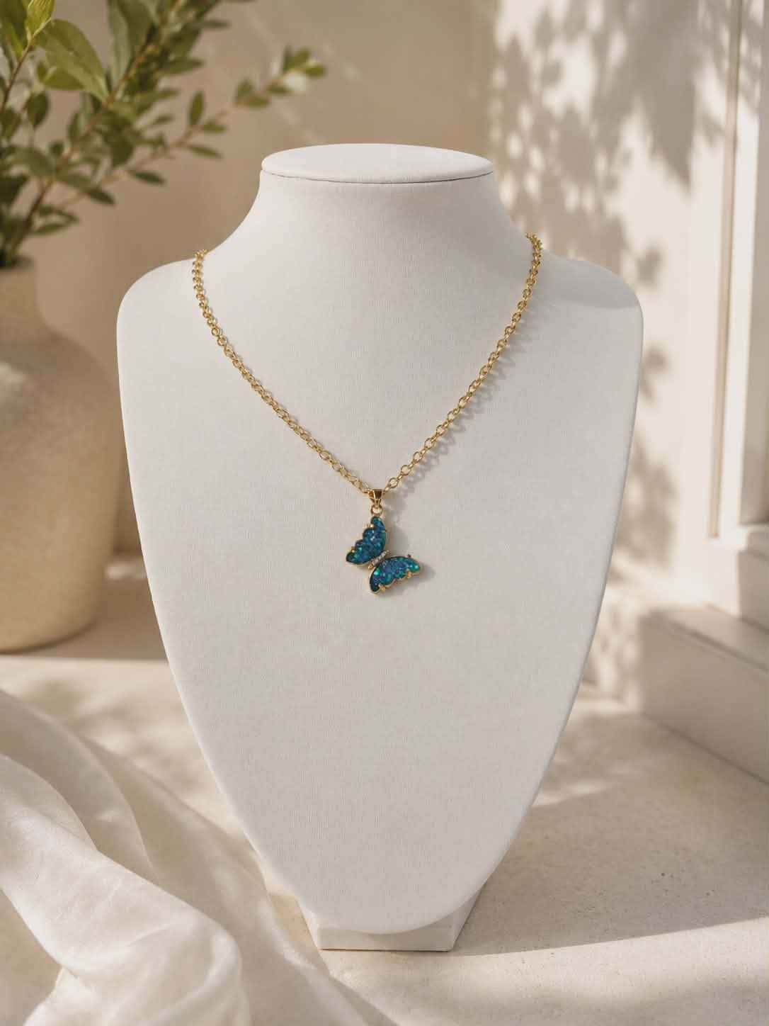 Collier "papillon bleu"