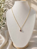 Collier "médaillon violet"