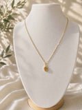 Collier "médaillon jaune"